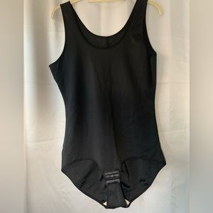 Shape wear one piece.  Size 3X 40% spandex Excellent condition. Like New